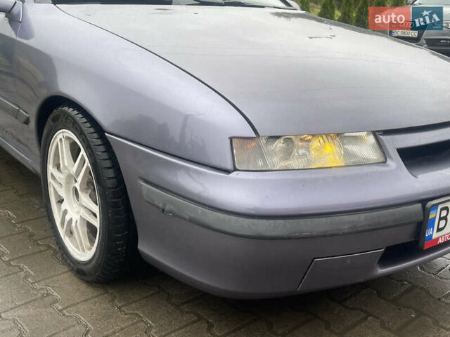 Синій Опель Калібра, об'ємом двигуна 3.2 л та пробігом 170 тис. км за 4300 $, фото 15 на Automoto.ua