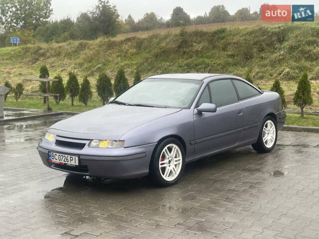 Синій Опель Калібра, об'ємом двигуна 3.2 л та пробігом 170 тис. км за 4500 $, фото 2 на Automoto.ua
