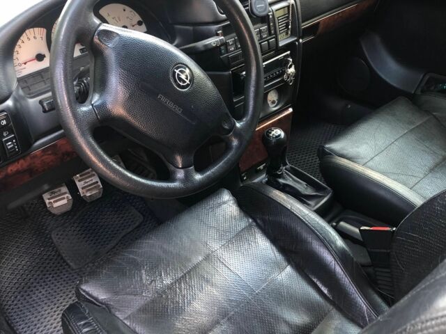 Синій Опель Калібра, об'ємом двигуна 2.5 л та пробігом 270 тис. км за 3200 $, фото 5 на Automoto.ua