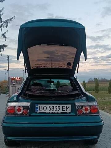 Зеленый Опель Калибра, объемом двигателя 2 л и пробегом 365 тыс. км за 2200 $, фото 4 на Automoto.ua