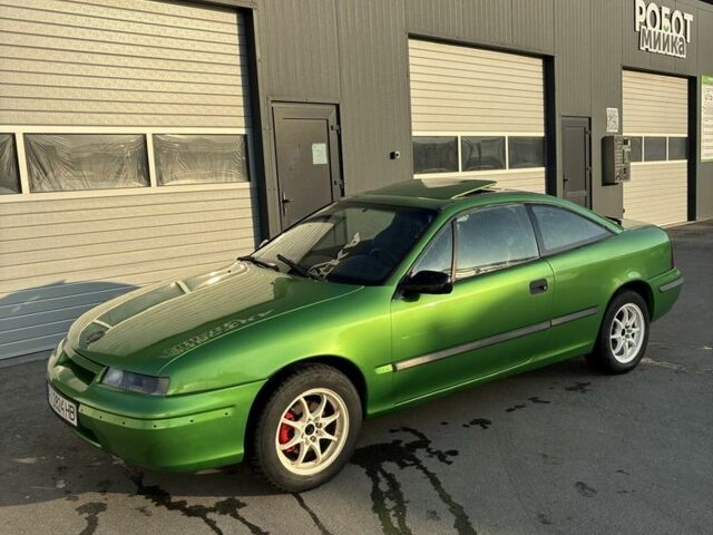 Зеленый Опель Калибра, объемом двигателя 2 л и пробегом 280 тыс. км за 2600 $, фото 4 на Automoto.ua