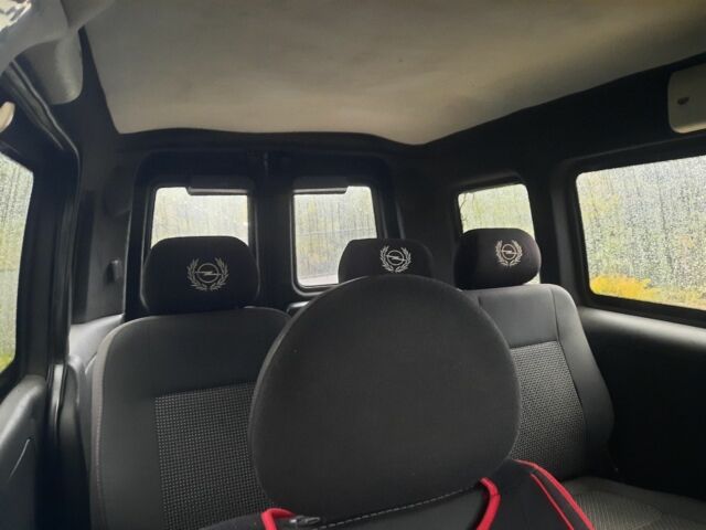 Белый Опель Кампо, объемом двигателя 3 л и пробегом 250 тыс. км за 2350 $, фото 9 на Automoto.ua