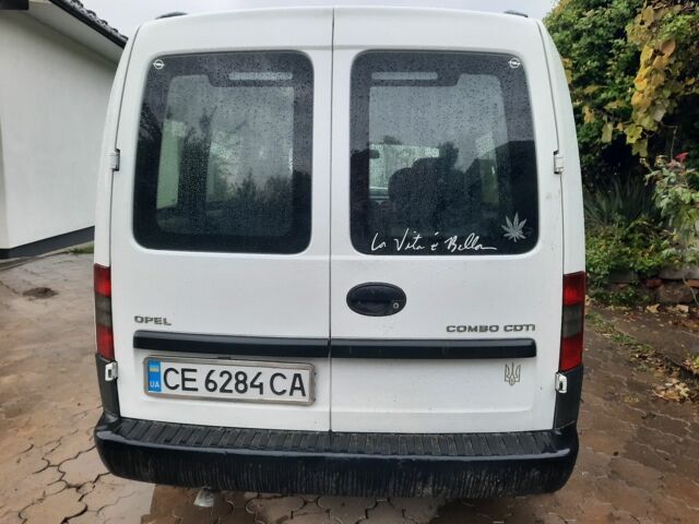 Белый Опель Кампо, объемом двигателя 3 л и пробегом 250 тыс. км за 2350 $, фото 15 на Automoto.ua