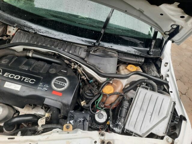 Белый Опель Кампо, объемом двигателя 3 л и пробегом 250 тыс. км за 2350 $, фото 13 на Automoto.ua