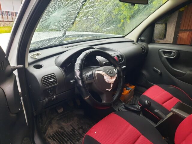 Белый Опель Кампо, объемом двигателя 3 л и пробегом 250 тыс. км за 2350 $, фото 4 на Automoto.ua