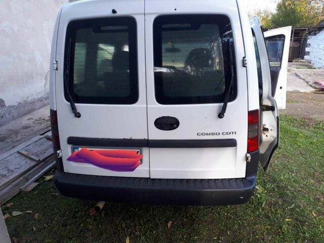 Белый Опель Кампо, объемом двигателя 1.3 л и пробегом 300 тыс. км за 3500 $, фото 3 на Automoto.ua