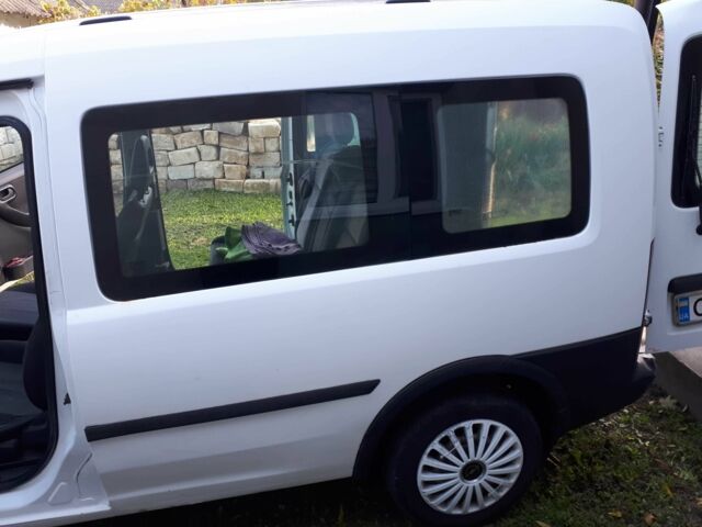 Белый Опель Кампо, объемом двигателя 1.3 л и пробегом 300 тыс. км за 3500 $, фото 7 на Automoto.ua