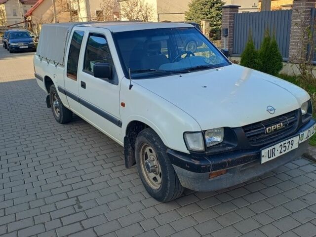 Белый Опель Кампо, объемом двигателя 3.1 л и пробегом 211 тыс. км за 3810 $, фото 2 на Automoto.ua