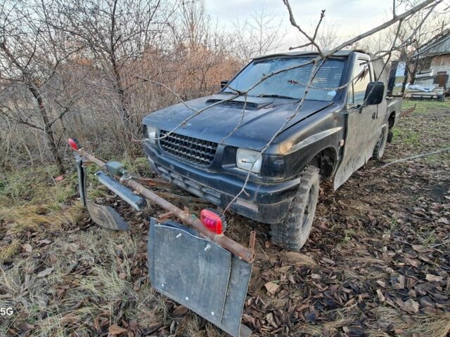 Черный Опель Кампо, объемом двигателя 3 л и пробегом 1 тыс. км за 476 $, фото 1 на Automoto.ua