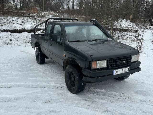 Черный Опель Кампо, объемом двигателя 3 л и пробегом 321 тыс. км за 1768 $, фото 2 на Automoto.ua