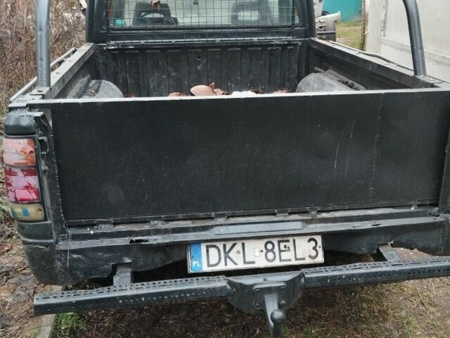 Черный Опель Кампо, объемом двигателя 2.7 л и пробегом 340 тыс. км за 949 $, фото 2 на Automoto.ua