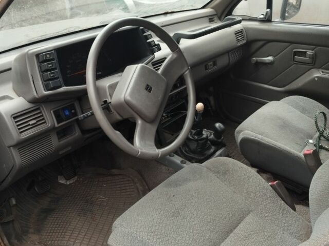 Черный Опель Кампо, объемом двигателя 2.7 л и пробегом 340 тыс. км за 949 $, фото 3 на Automoto.ua