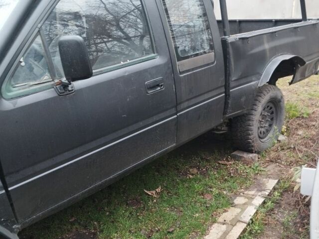 Черный Опель Кампо, объемом двигателя 2.7 л и пробегом 340 тыс. км за 949 $, фото 4 на Automoto.ua