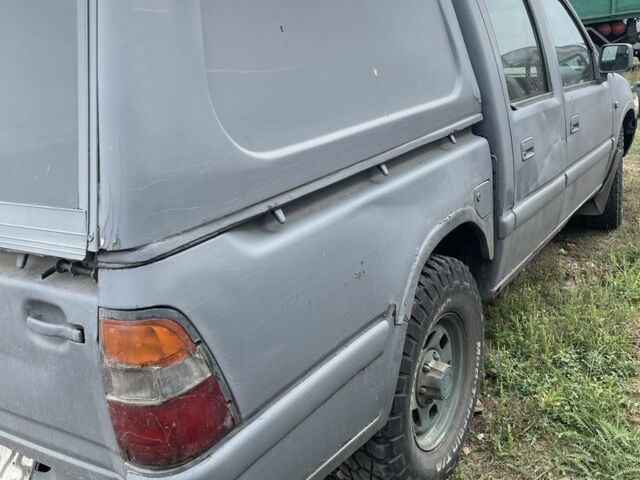 Серый Опель Кампо, объемом двигателя 3 л и пробегом 200 тыс. км за 1900 $, фото 4 на Automoto.ua