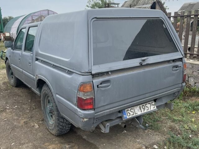 Серый Опель Кампо, объемом двигателя 3 л и пробегом 200 тыс. км за 1900 $, фото 3 на Automoto.ua