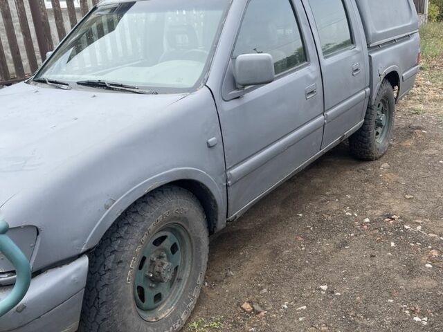 Серый Опель Кампо, объемом двигателя 3 л и пробегом 200 тыс. км за 1900 $, фото 5 на Automoto.ua
