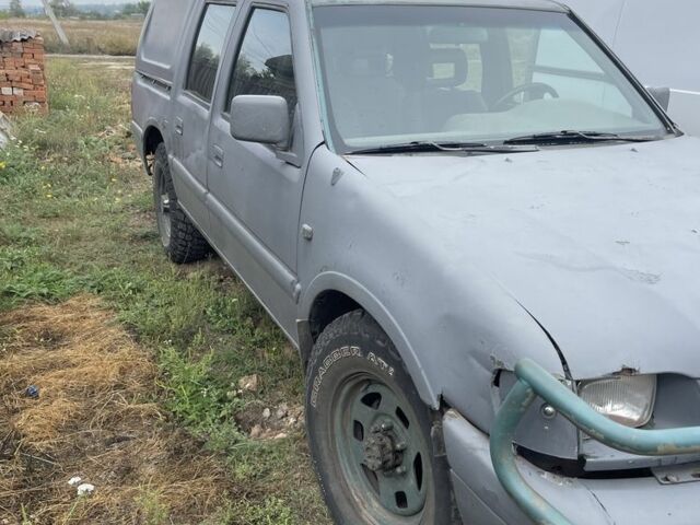 Серый Опель Кампо, объемом двигателя 3 л и пробегом 200 тыс. км за 1900 $, фото 2 на Automoto.ua