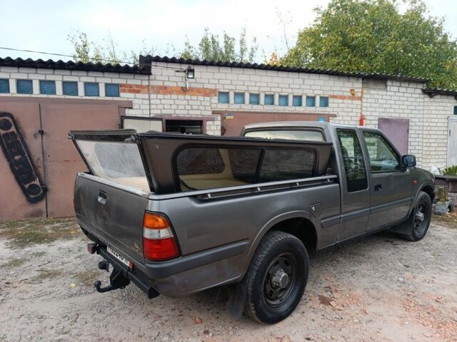 Серый Опель Кампо, объемом двигателя 2.5 л и пробегом 286 тыс. км за 3300 $, фото 8 на Automoto.ua