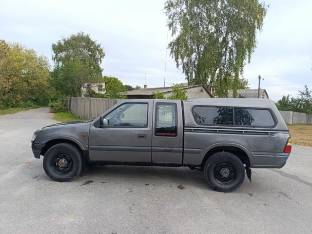 Серый Опель Кампо, объемом двигателя 2.5 л и пробегом 286 тыс. км за 3300 $, фото 7 на Automoto.ua