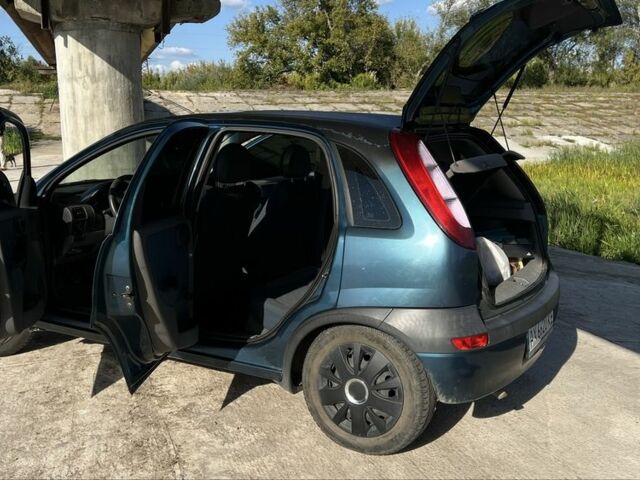 Синий Опель Кампо, объемом двигателя 1 л и пробегом 230 тыс. км за 3000 $, фото 4 на Automoto.ua