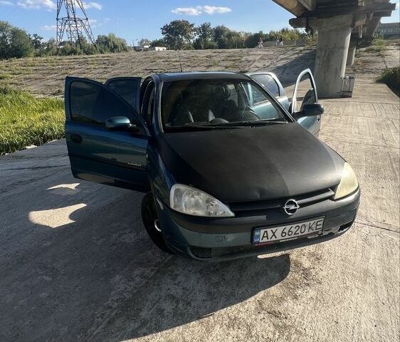 Синий Опель Кампо, объемом двигателя 1 л и пробегом 230 тыс. км за 3000 $, фото 5 на Automoto.ua