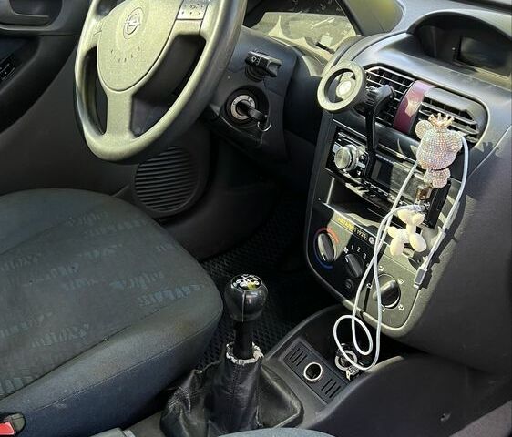 Синий Опель Кампо, объемом двигателя 1 л и пробегом 230 тыс. км за 3000 $, фото 3 на Automoto.ua