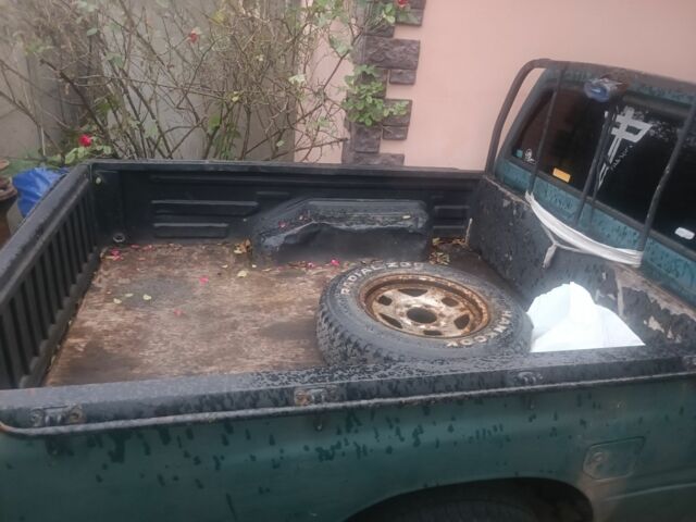 Зеленый Опель Кампо, объемом двигателя 2 л и пробегом 299 тыс. км за 2386 $, фото 3 на Automoto.ua