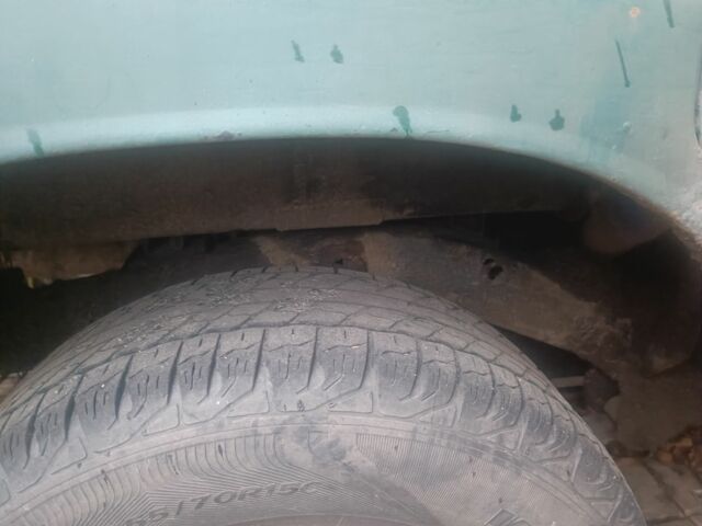 Зеленый Опель Кампо, объемом двигателя 2 л и пробегом 299 тыс. км за 2386 $, фото 4 на Automoto.ua