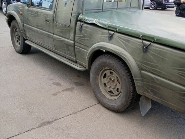 Зеленый Опель Кампо, объемом двигателя 3 л и пробегом 186 тыс. км за 4500 $, фото 6 на Automoto.ua