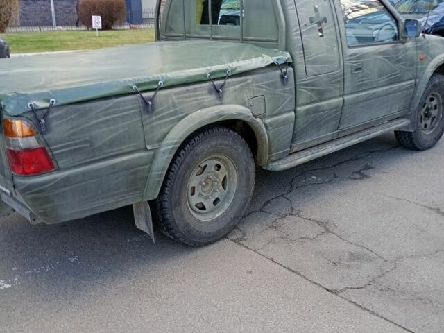 Зеленый Опель Кампо, объемом двигателя 3 л и пробегом 186 тыс. км за 4500 $, фото 3 на Automoto.ua