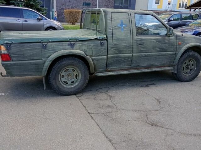 Зеленый Опель Кампо, объемом двигателя 3 л и пробегом 186 тыс. км за 4500 $, фото 4 на Automoto.ua