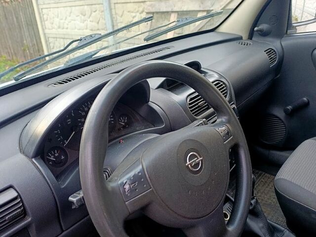 Белый Опель Комбо груз.-пасс., объемом двигателя 1.2 л и пробегом 410 тыс. км за 3500 $, фото 8 на Automoto.ua