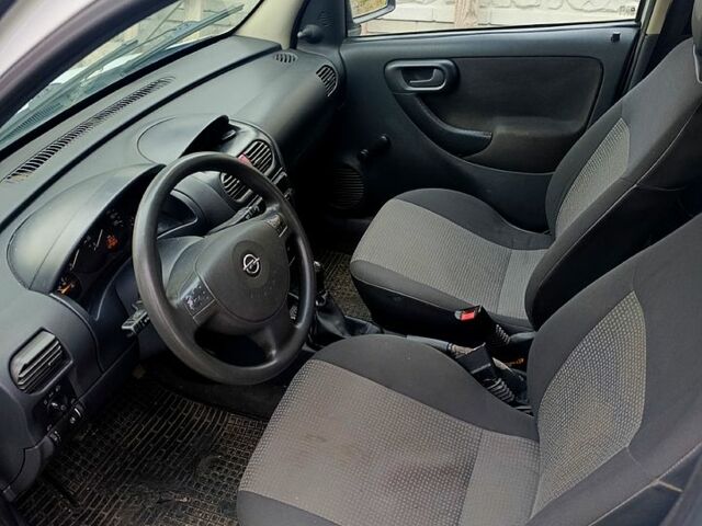 Белый Опель Комбо груз.-пасс., объемом двигателя 1.2 л и пробегом 410 тыс. км за 3500 $, фото 7 на Automoto.ua