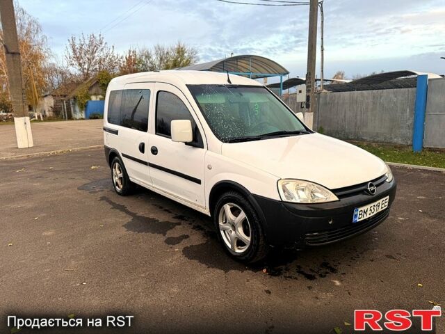 Белый Опель Комбо груз.-пасс., объемом двигателя 1.6 л и пробегом 150 тыс. км за 3650 $, фото 2 на Automoto.ua