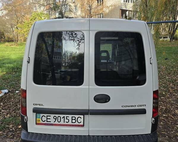 Белый Опель Комбо груз.-пасс., объемом двигателя 1.25 л и пробегом 182 тыс. км за 3500 $, фото 7 на Automoto.ua