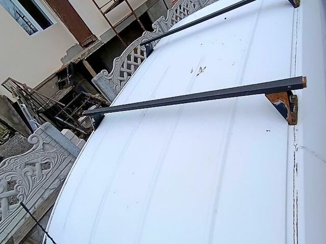 Белый Опель Комбо груз.-пасс., объемом двигателя 1.2 л и пробегом 410 тыс. км за 3500 $, фото 6 на Automoto.ua