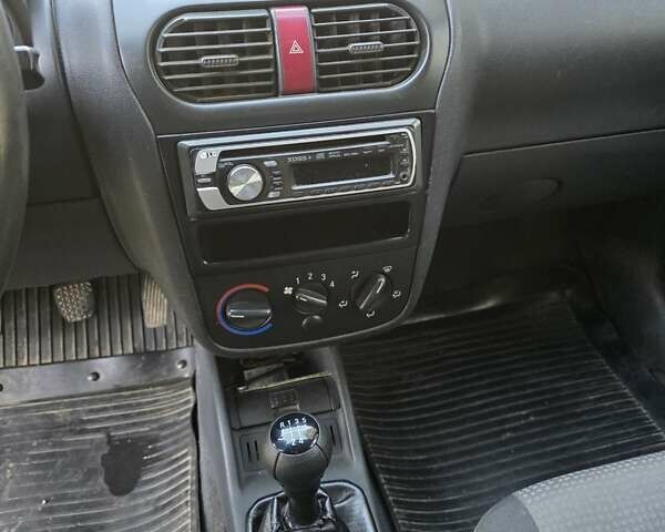 Белый Опель Комбо груз.-пасс., объемом двигателя 1.25 л и пробегом 182 тыс. км за 3500 $, фото 12 на Automoto.ua