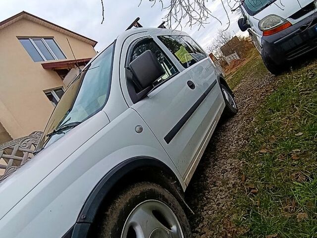 Белый Опель Комбо груз.-пасс., объемом двигателя 1.2 л и пробегом 410 тыс. км за 3500 $, фото 1 на Automoto.ua