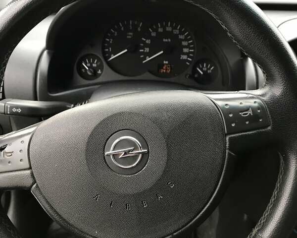 Белый Опель Комбо груз.-пасс., объемом двигателя 1.2 л и пробегом 154 тыс. км за 3800 $, фото 13 на Automoto.ua