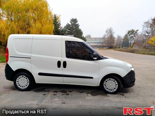 Белый Опель Комбо груз.-пасс., объемом двигателя 1.2 л и пробегом 170 тыс. км за 3650 $, фото 2 на Automoto.ua