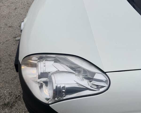 Белый Опель Комбо груз.-пасс., объемом двигателя 1.25 л и пробегом 292 тыс. км за 5500 $, фото 12 на Automoto.ua