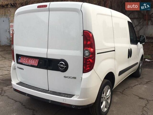 Белый Опель Комбо груз.-пасс., объемом двигателя 1.25 л и пробегом 260 тыс. км за 8900 $, фото 2 на Automoto.ua