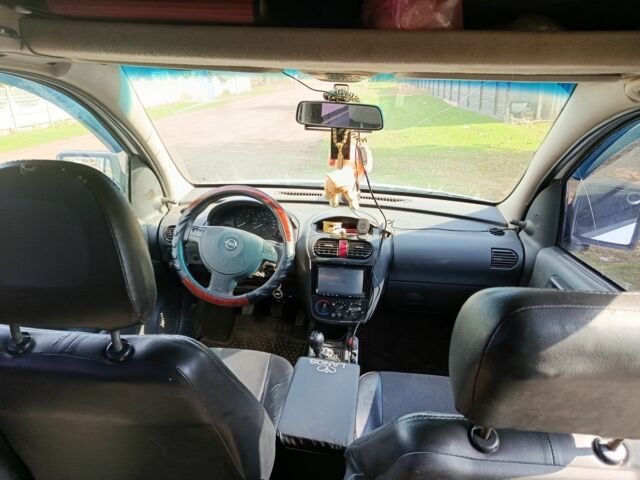 Белый Опель Комбо груз.-пасс., объемом двигателя 2 л и пробегом 260 тыс. км за 5000 $, фото 1 на Automoto.ua