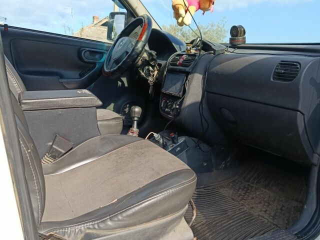 Белый Опель Комбо груз.-пасс., объемом двигателя 2 л и пробегом 260 тыс. км за 5000 $, фото 5 на Automoto.ua