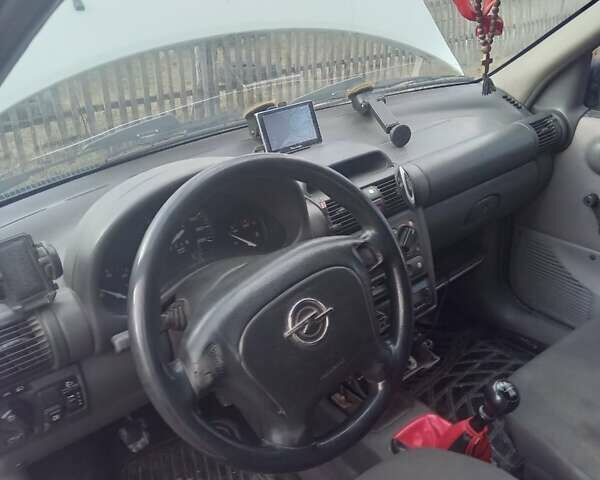 Белый Опель Комбо груз.-пасс., объемом двигателя 1.4 л и пробегом 450 тыс. км за 1250 $, фото 5 на Automoto.ua