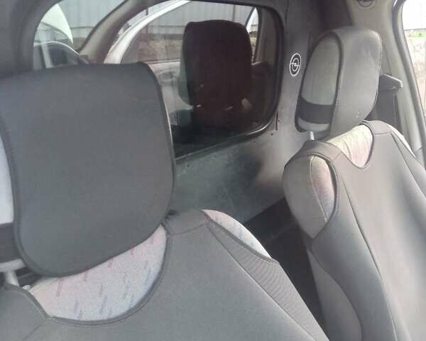 Белый Опель Комбо груз.-пасс., объемом двигателя 1.4 л и пробегом 450 тыс. км за 1250 $, фото 4 на Automoto.ua