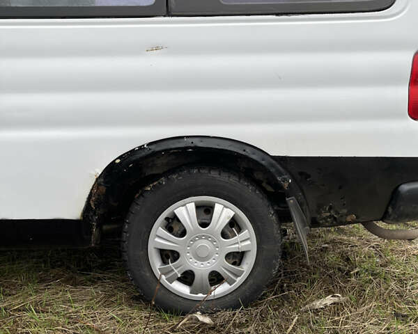 Белый Опель Комбо груз.-пасс., объемом двигателя 1.4 л и пробегом 383 тыс. км за 1300 $, фото 4 на Automoto.ua