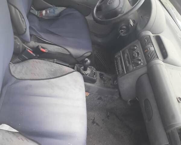 Белый Опель Комбо груз.-пасс., объемом двигателя 1.4 л и пробегом 251 тыс. км за 600 $, фото 4 на Automoto.ua