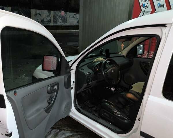 Белый Опель Комбо груз.-пасс., объемом двигателя 1.69 л и пробегом 475 тыс. км за 3500 $, фото 2 на Automoto.ua