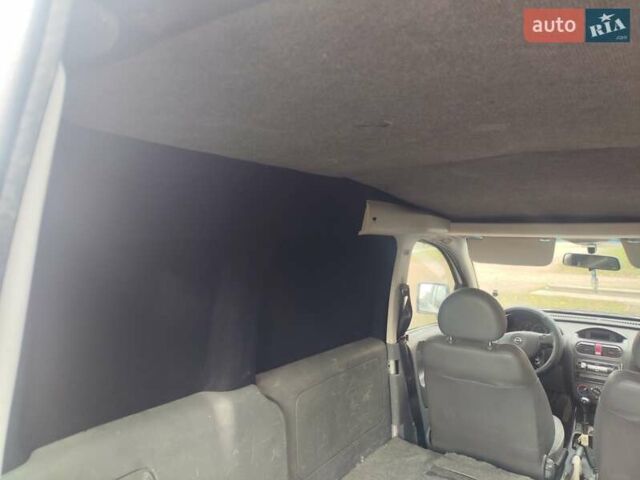 Белый Опель Комбо груз.-пасс., объемом двигателя 1.69 л и пробегом 235 тыс. км за 1998 $, фото 5 на Automoto.ua